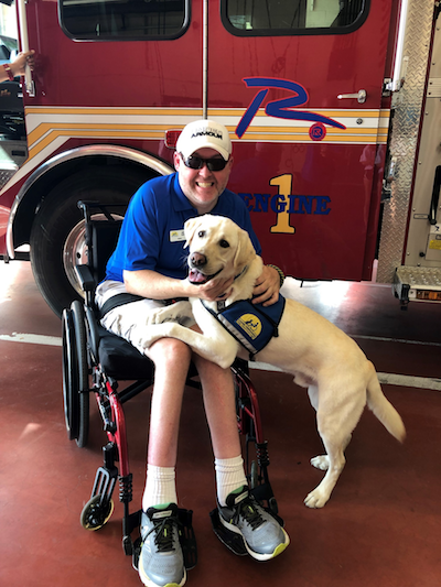 person with Canine Companions service dog
