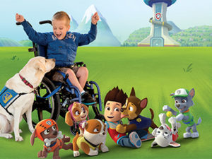 Paw Patrol characters and child and Canine Companions service dog