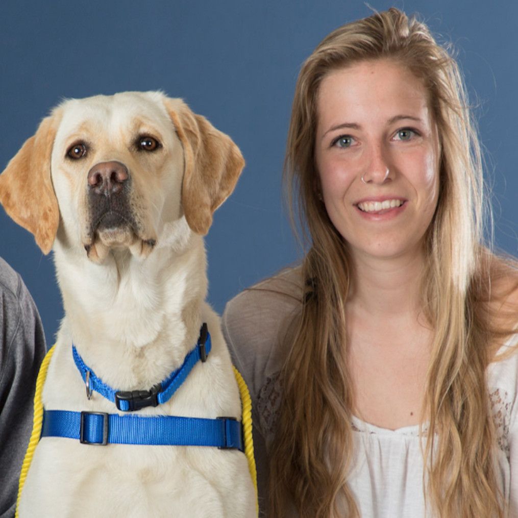 Volunteer puppy raiser Emily Bartlett with yellow Canine Companions puppy