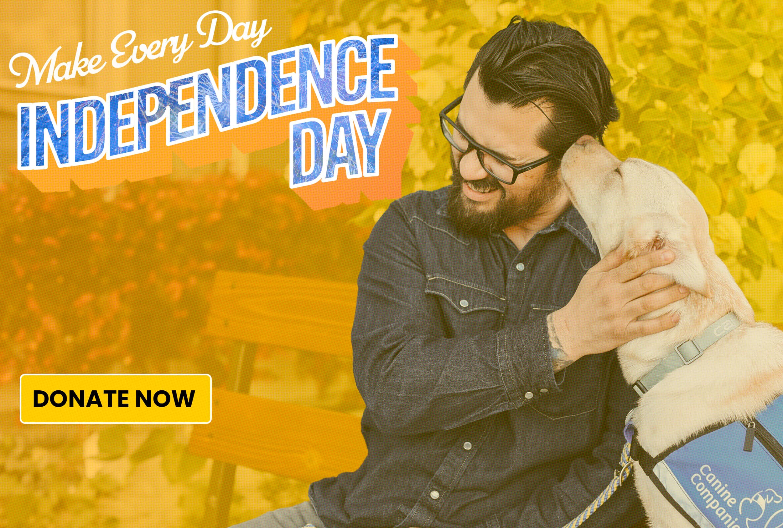 Man smiling and hugging a service dog in a blue vest beside text that reads Independence Day and Donate Now