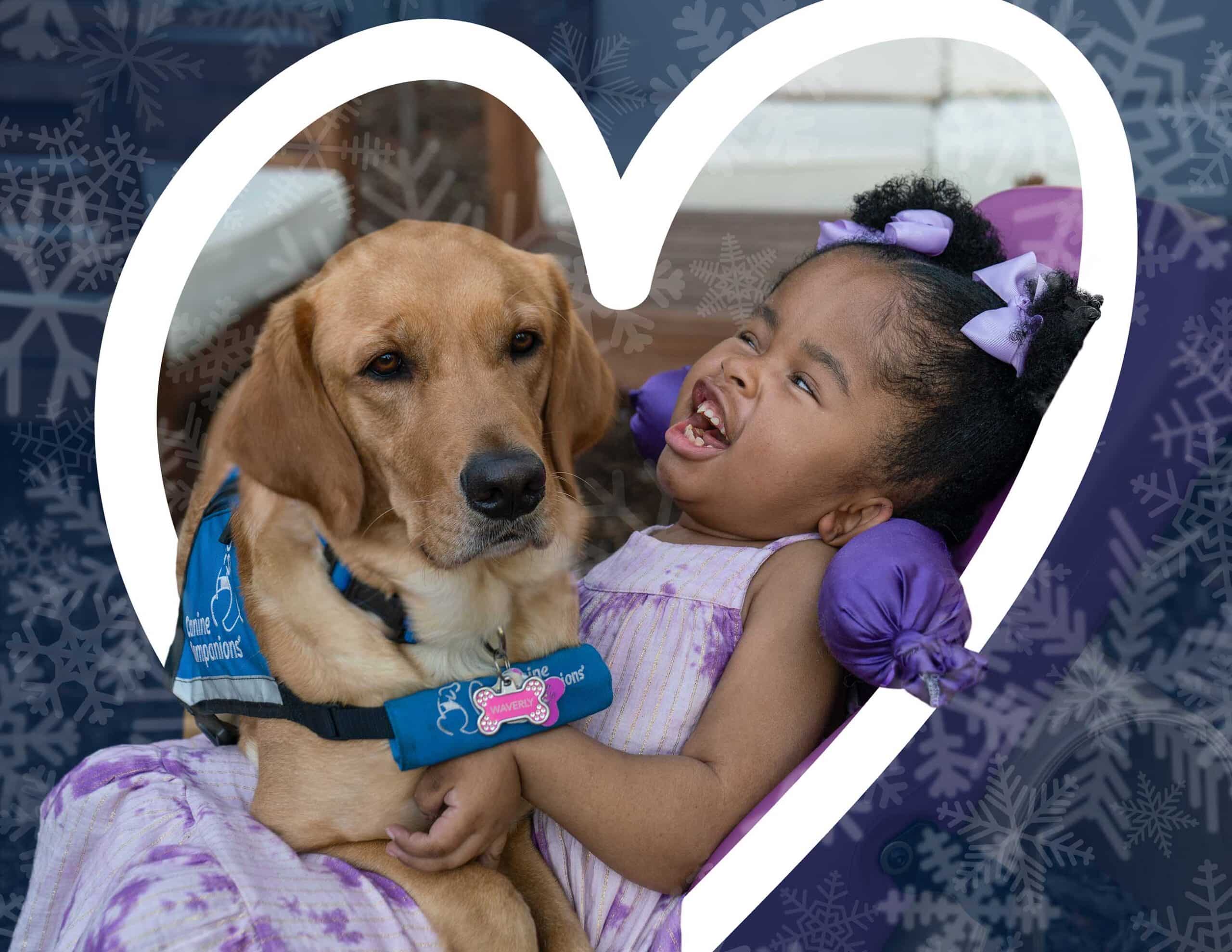 A heart with snowflakes around the image of a young girl with a yellow lab service dog in blue vest across her lap