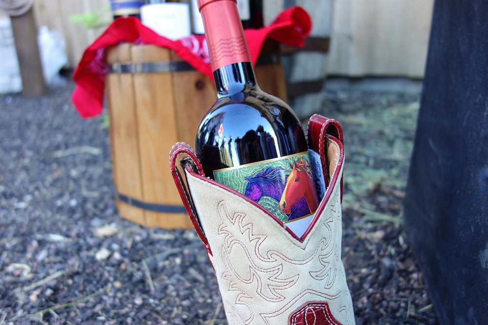 bottle of wine in cowboy boots