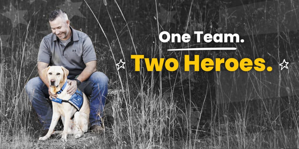 a banner image of a man with a yellow lab service dog against a gray background featuring an american flag. The tagline says One Team. Two Heroes.
