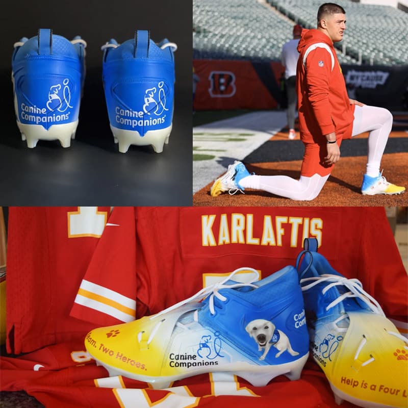 Canine Companions branded cleats sit in front of a George Karlaftis jersey