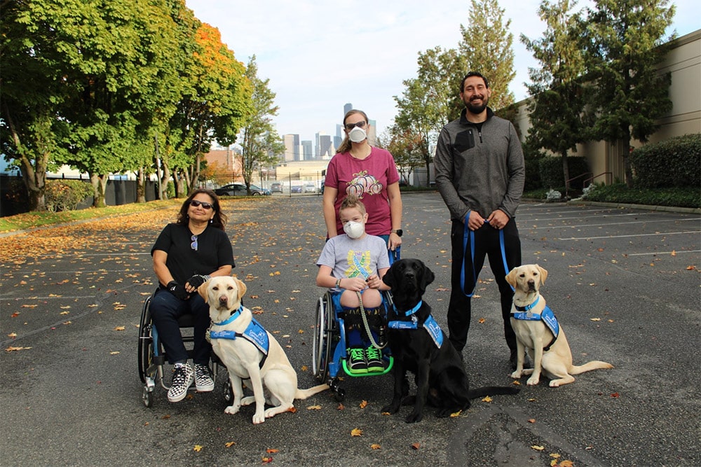 three first clients at puget sound field office with their service dogs