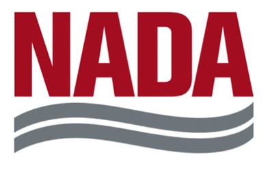 NADA logo with red text and gray wavy lines underneath.