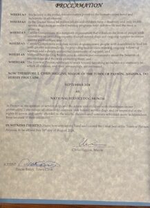 Proclamation from the mayor of Payson, Arizona, declaring September 2024 as National Service Dog Month, emphasizing the benefits of service dogs and the need for greater accessibility and independence for people with disabilities.