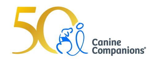 50th anniversary logo for Canine Companions featuring a stylized number 50 and a blue outline drawing of a person with a dog.