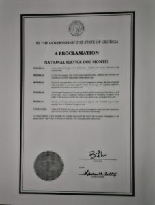 A proclamation from the State of Georgia declaring September 2024 as National Service Dog Month, signed by the governor and the chief of staff.