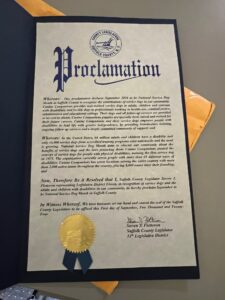 Proclamation document from Suffolk County Legislature, declaring September 2024 as National Service Dog Month in Suffolk County, NY, with a gold seal at the bottom.