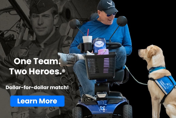 A person in a wheelchair smiling at a service dog wearing a blue vest, with a vintage photo of a military pilot in the background. Text reads 