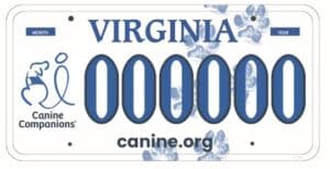 Virginia license plate with "Canine Companions" logo, featuring blue paw prints and the text "canine.org."