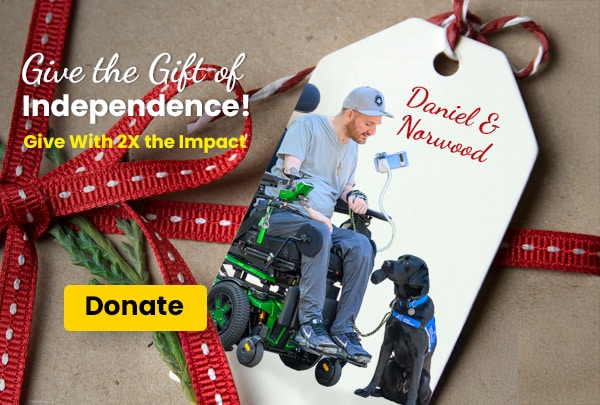 man in wheel chair in a gift tag