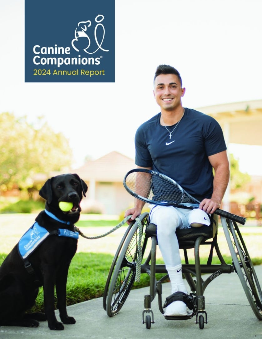 Cover of the Canine Companions 2024 Annual Report featuring the image of a young man in a wheelchair with a tennis racquet with a black lab service dog