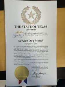 A certificate from the State of Texas, presented by Governor Greg Abbott, recognizing September 2025 as Service Dog Month. The certificate includes a circular gold seal and discusses the role of service dogs in enhancing the quality of life for individuals with disabilities.