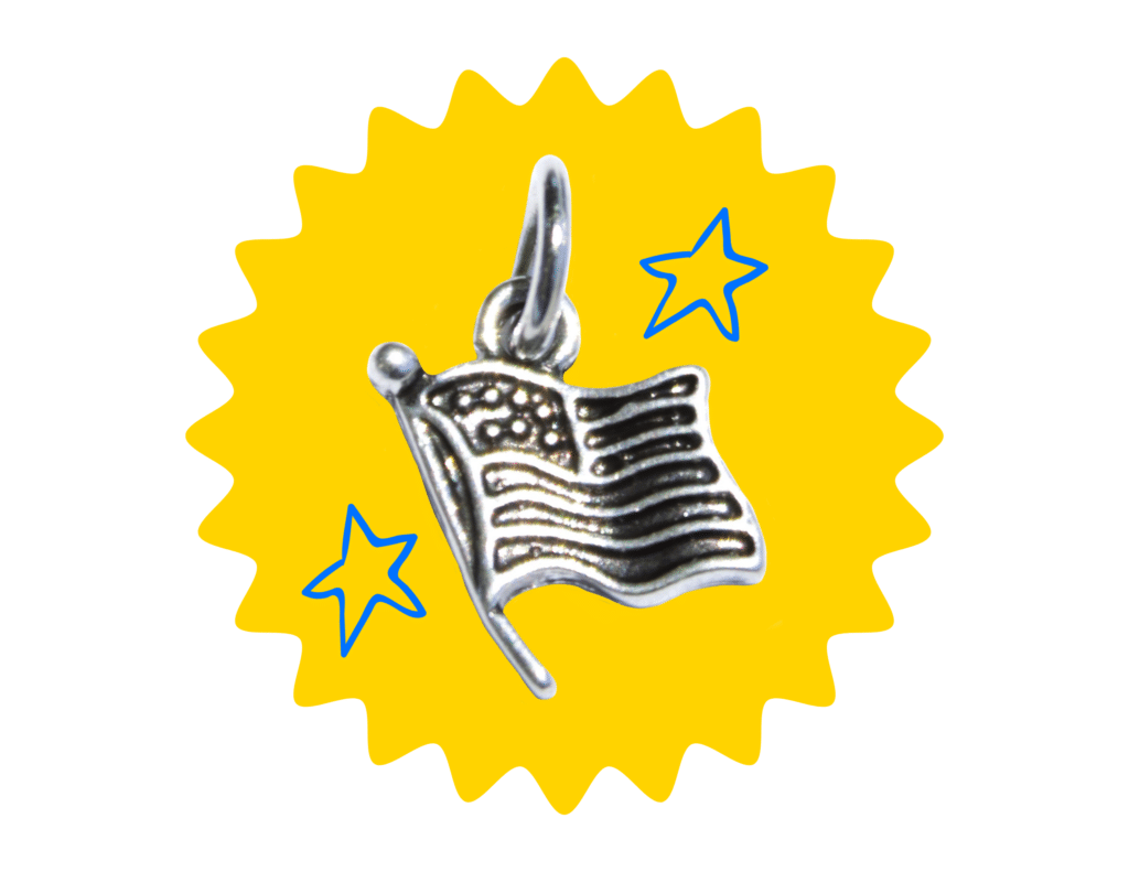 Silver American flag charm on a yellow starburst with blue stars on a black background